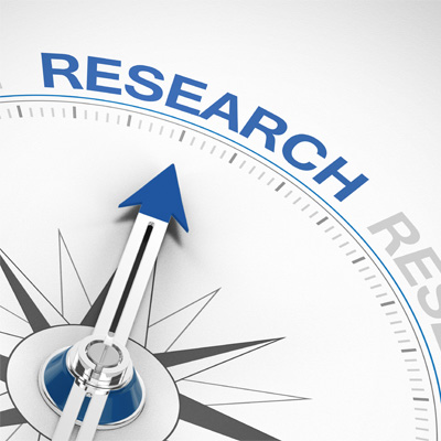 This image features a graphic of a compass with the needle pointing towards the word "RESEARCH".